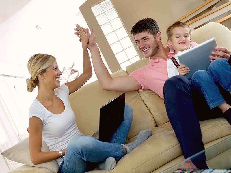 Mother and father high-fiving